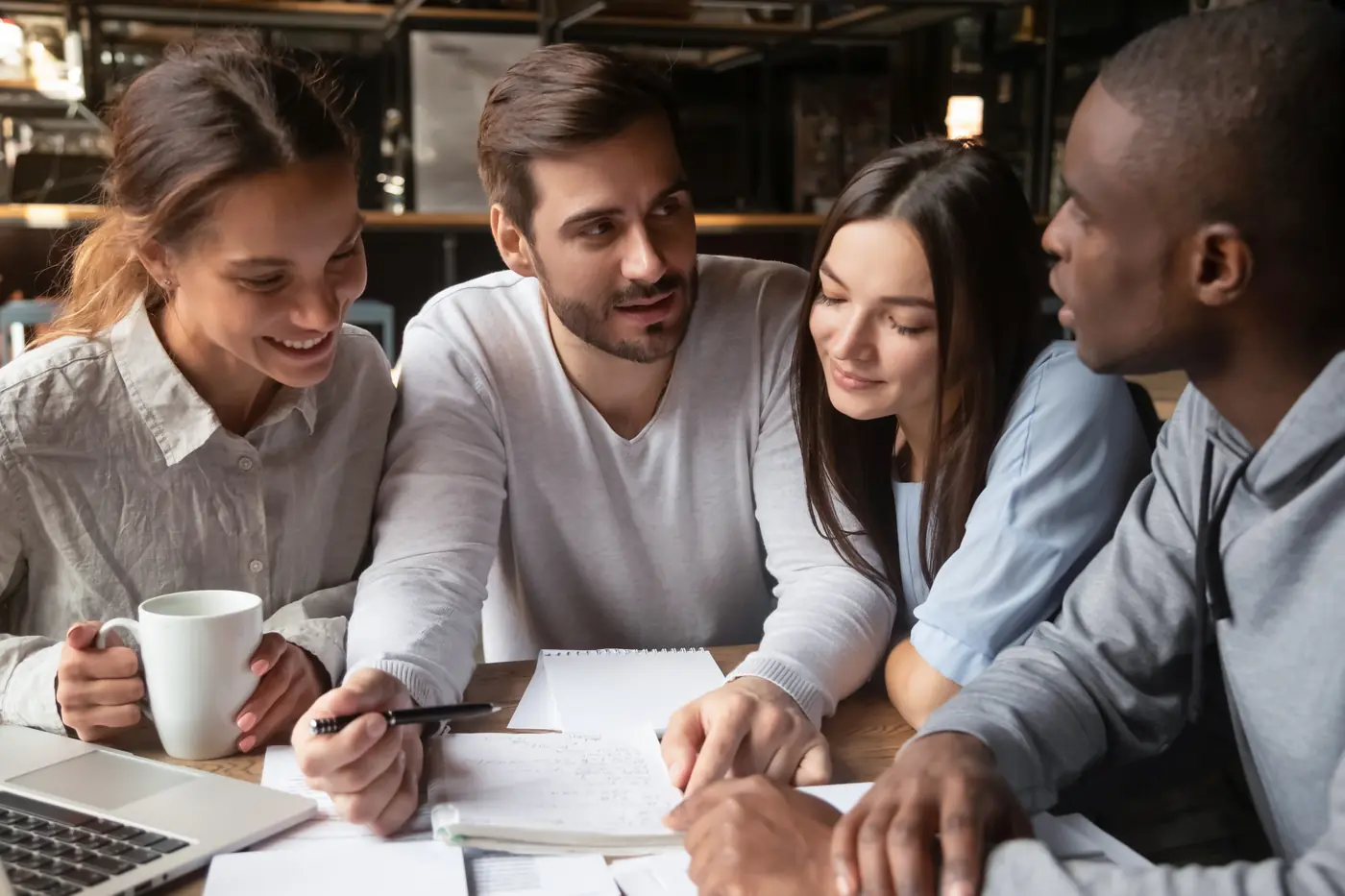 Members working together inside a lifestyle lounge